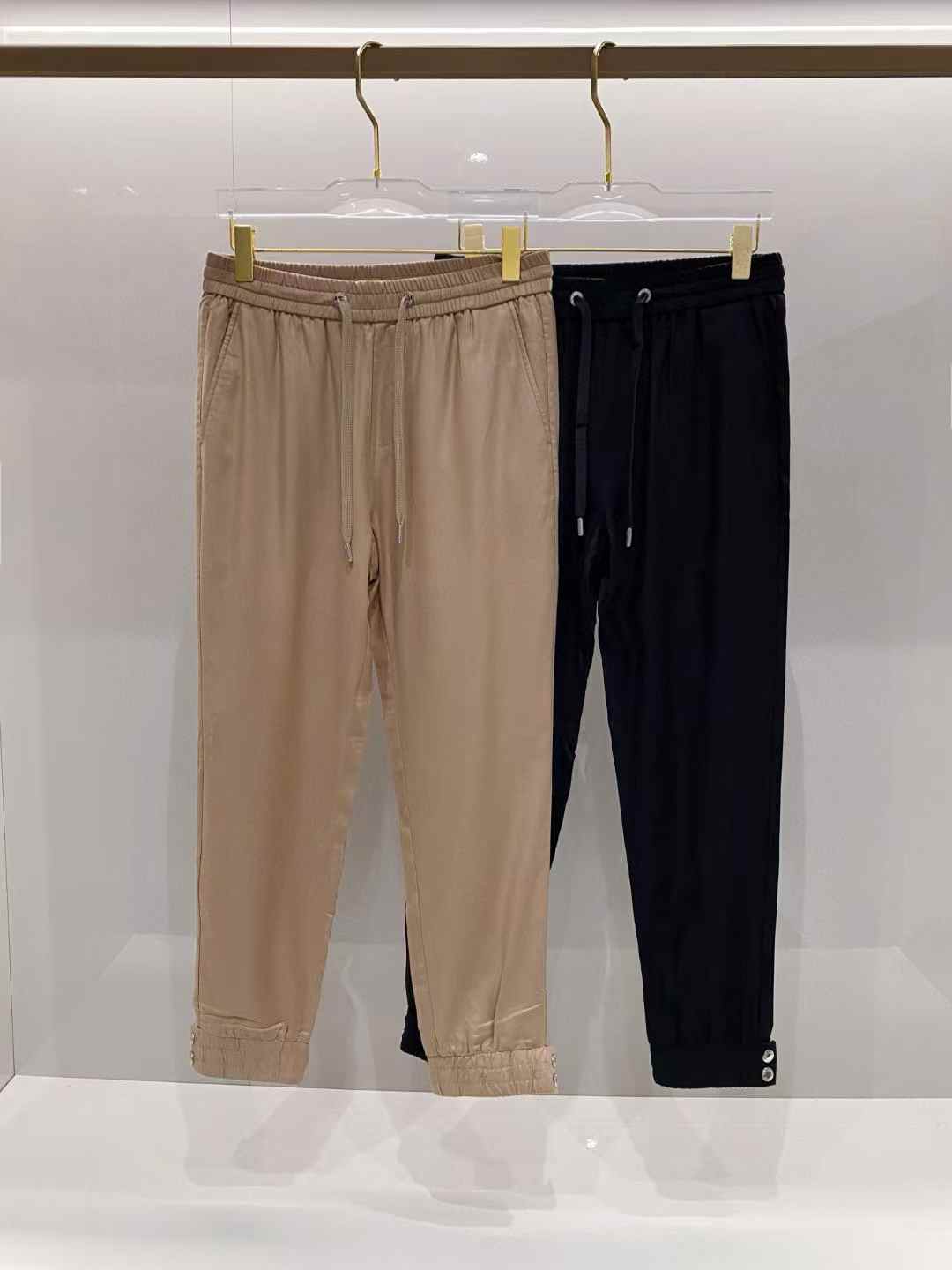 prada Stretch High-Rise Jogger in beige and black