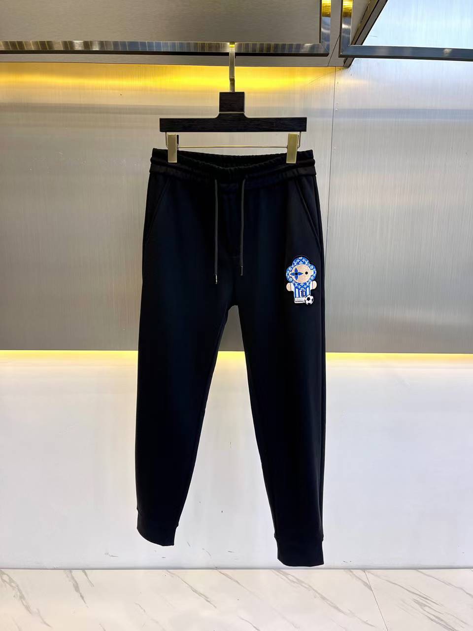 LV black Disney x Coach Spooky Eyes Track Pants