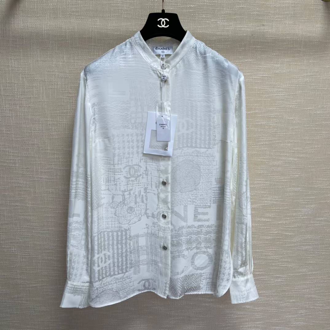 Chanel brand new silk blouse in ecru with a tone-on-tone monogram logo pattern shirt