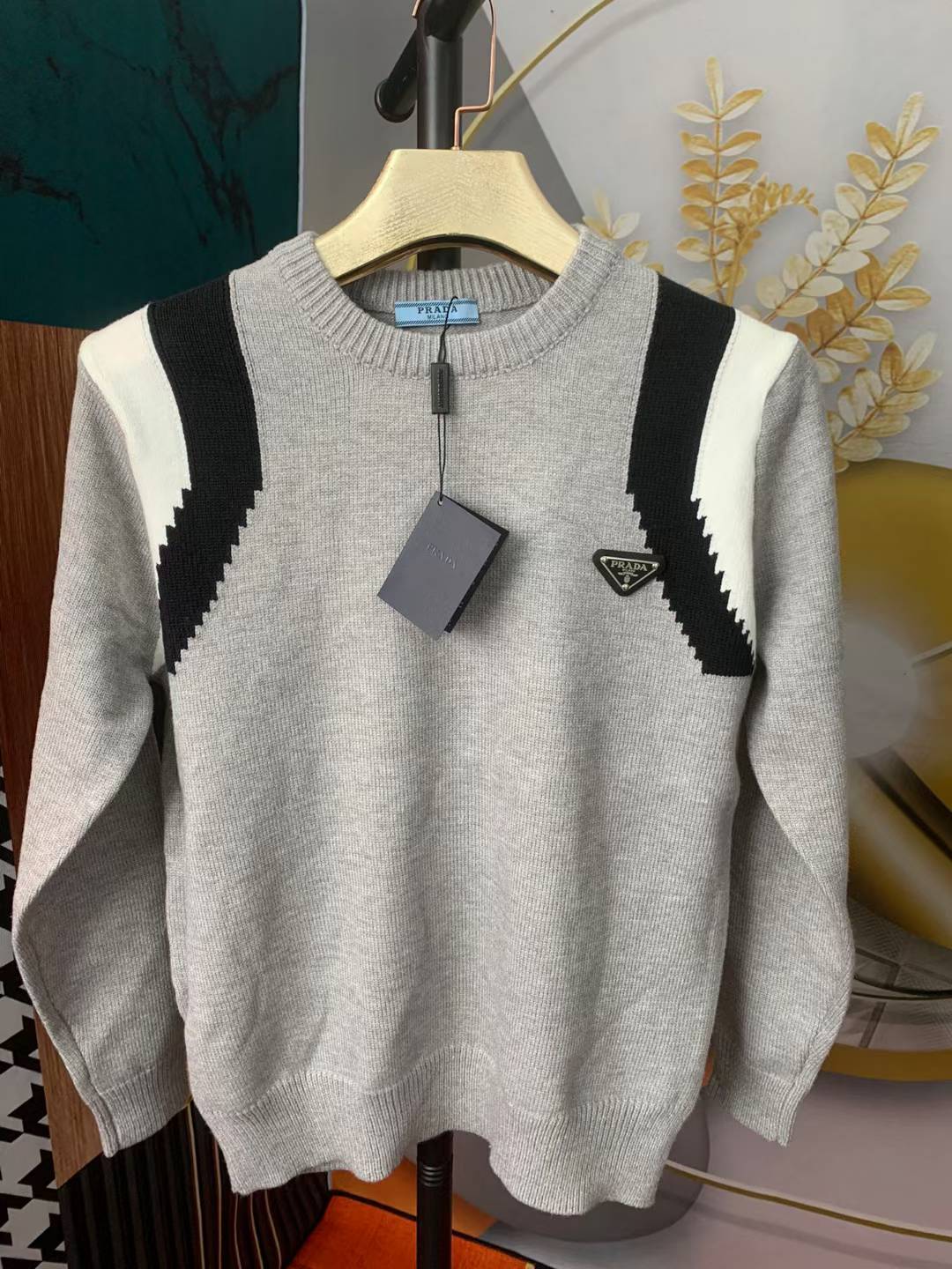 Prada crewneck sweater with black and white shoulder details