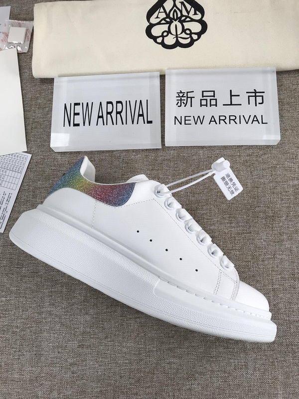 Alexander McQueen Oversized Sneaker in white leather with a rainbow glitter heel tab
