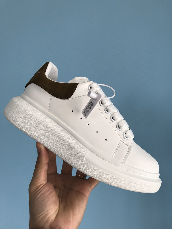 Alexander McQueen Oversized Sneakers in white leather with a brown heel counter