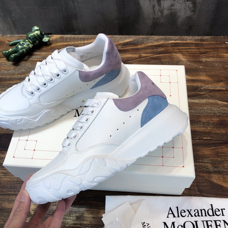 Alexander McQueen Court Trainer leather sneaker with a white upper and nude pink/light purple suede accent