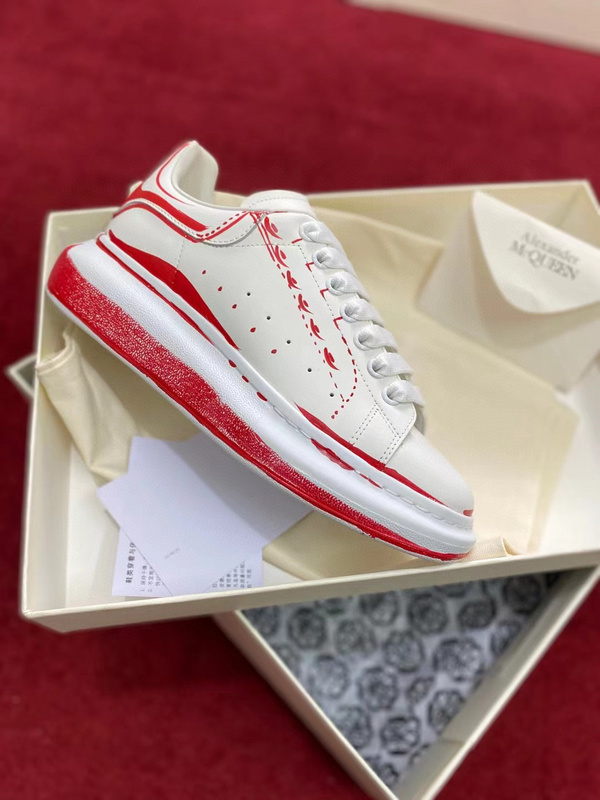 Alexander Mcqueen Oversized Sneaker in a white and 'Lust Red' colorway