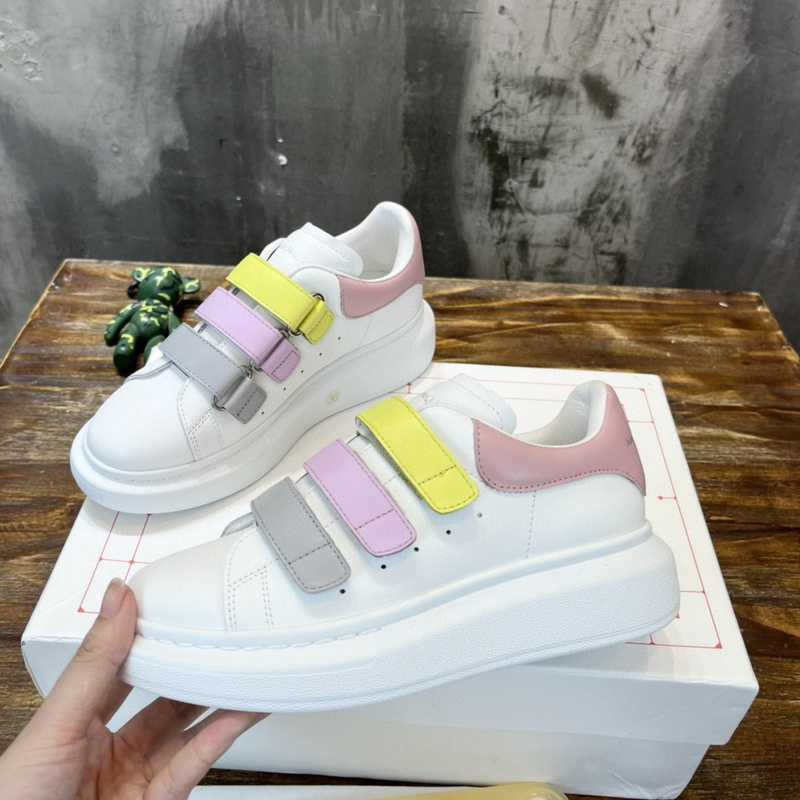 Alexander McQueen Oversized sneakers in white calf leather with a pink heel counter and multi-color touch straps
