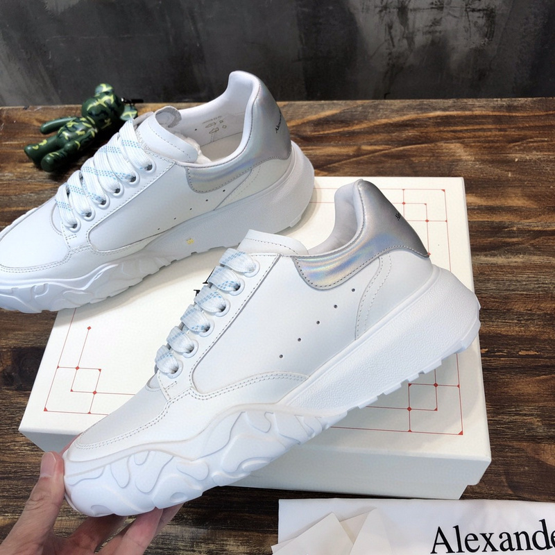 Alexander McQueen Oversized Court Trainer in white leather with a silver heel tab