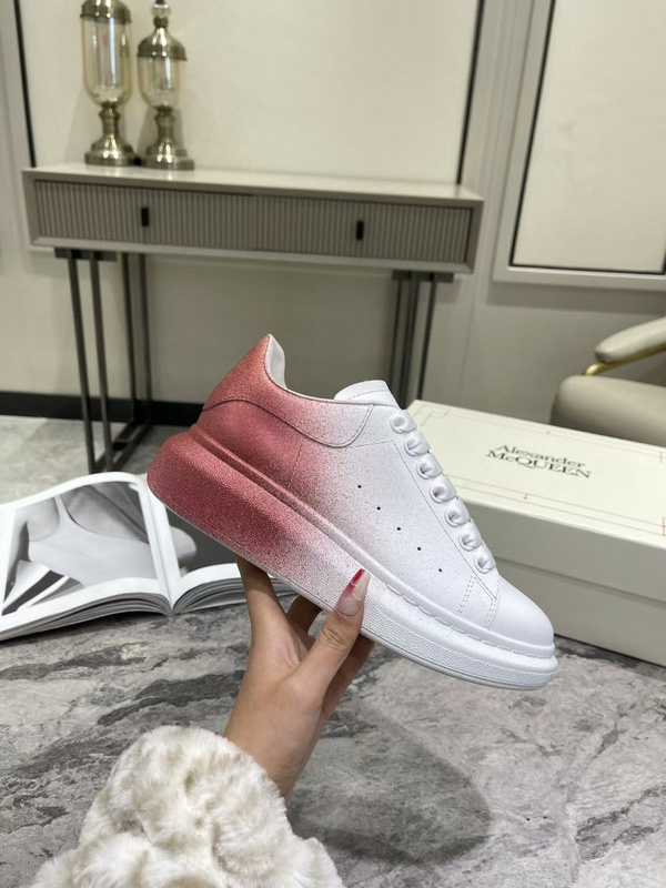 Alexander McQueen Oversized sneaker in a white and pink velvet spray gradient effect