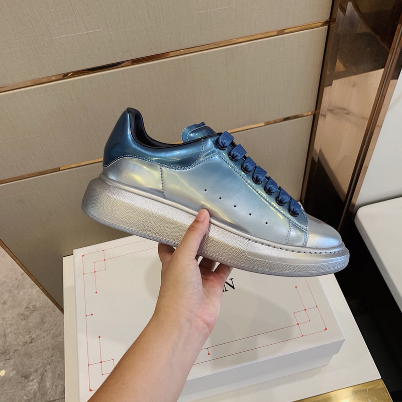 Alexander McQueen Oversized Sneaker in a metallic silver/blue gradient finish.
