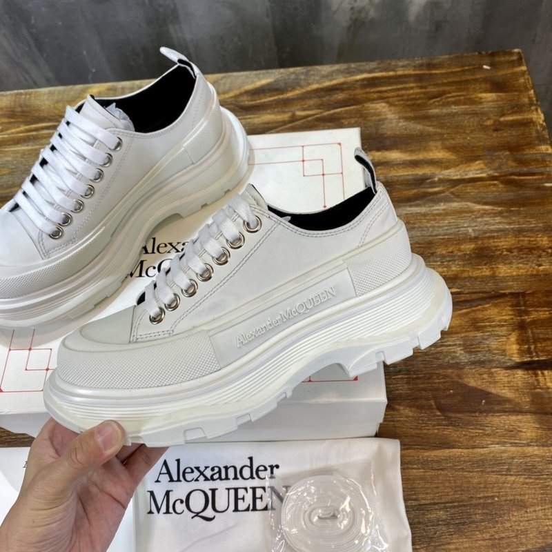 Alexander McQueen Tread Slick low-top canvas sneaker in white