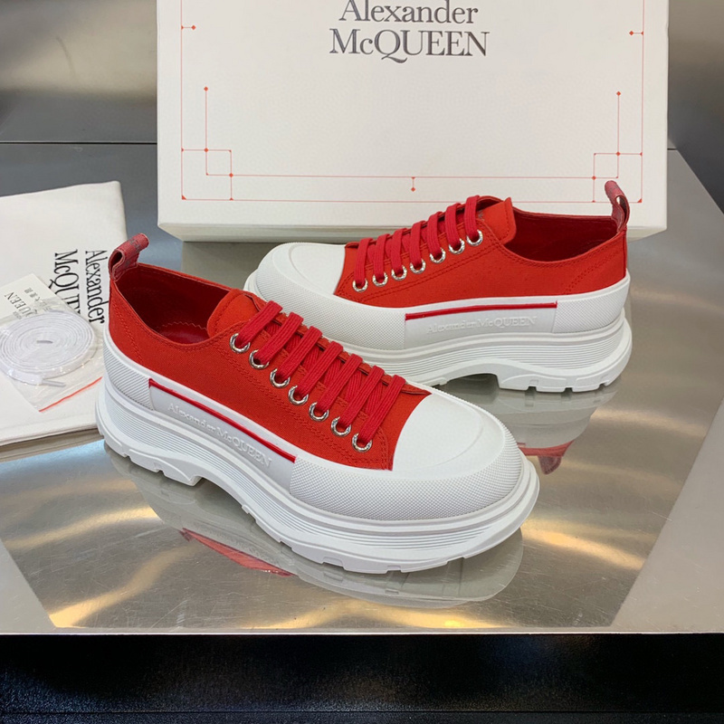 Alexander McQueen Tread Slick Lace Up sneakers in red and white