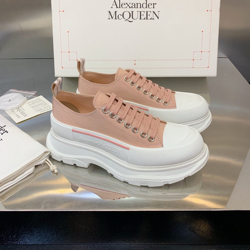 Alexander McQueen Tread Slick low-top canvas sneakers in pink and white