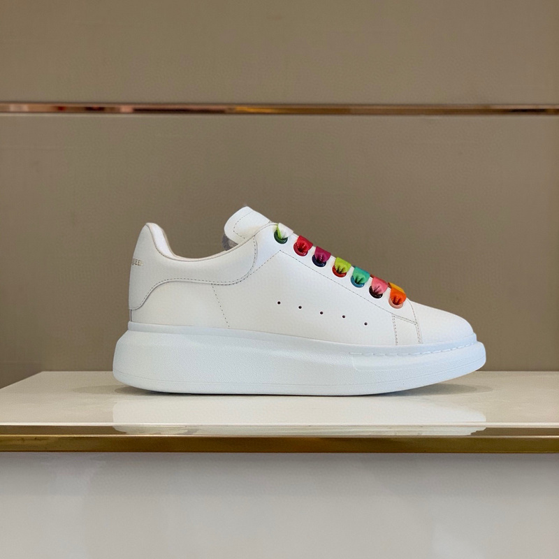 Alexander McQueen Oversized sneaker in white with rainbow laces.