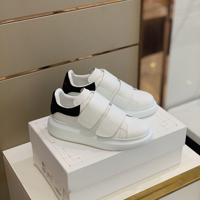 Alexander McQueen Oversized Triple Strap sneakers in white smooth calf leather with a black suede heel counter.