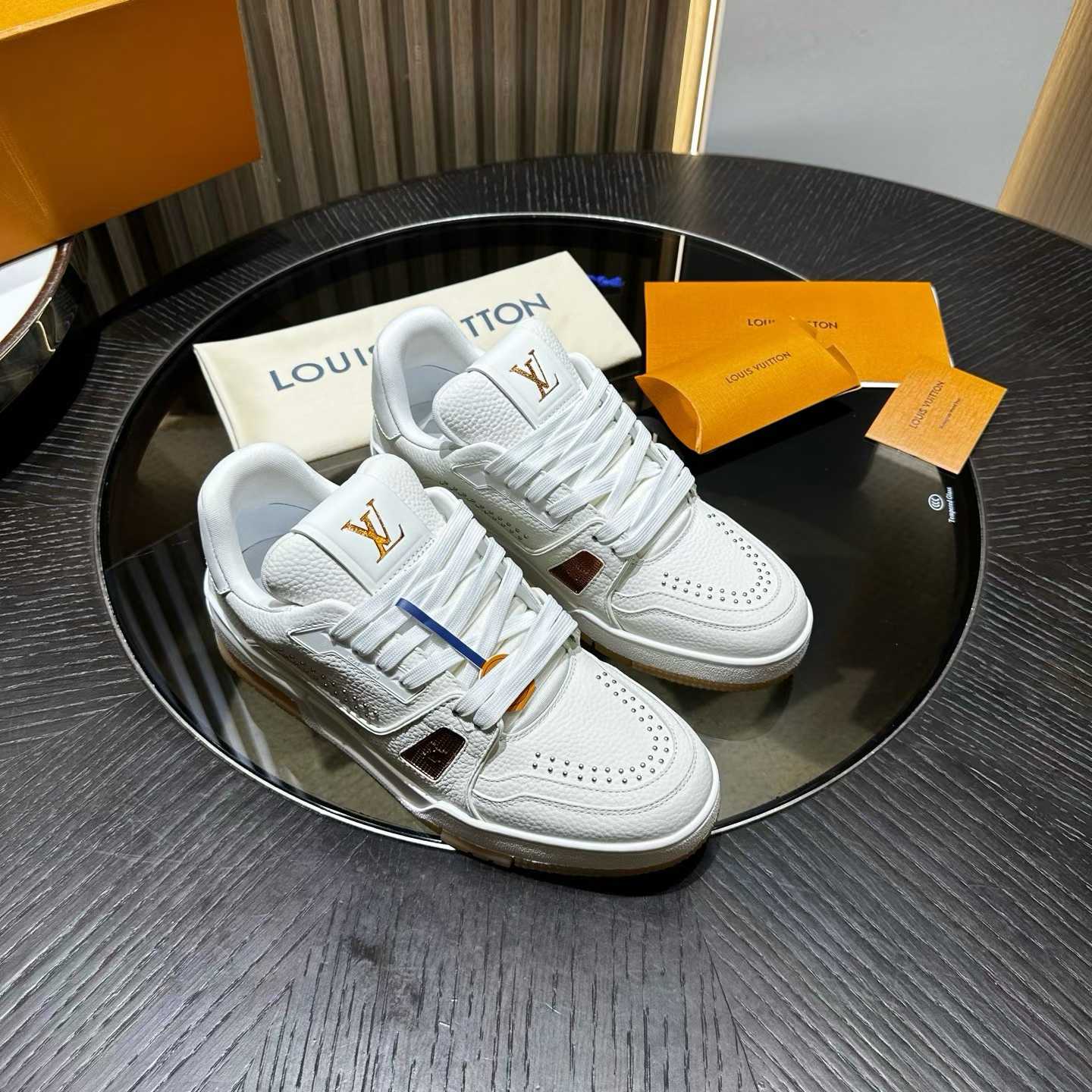 LV Trainer sneakers in white grained calf leather.