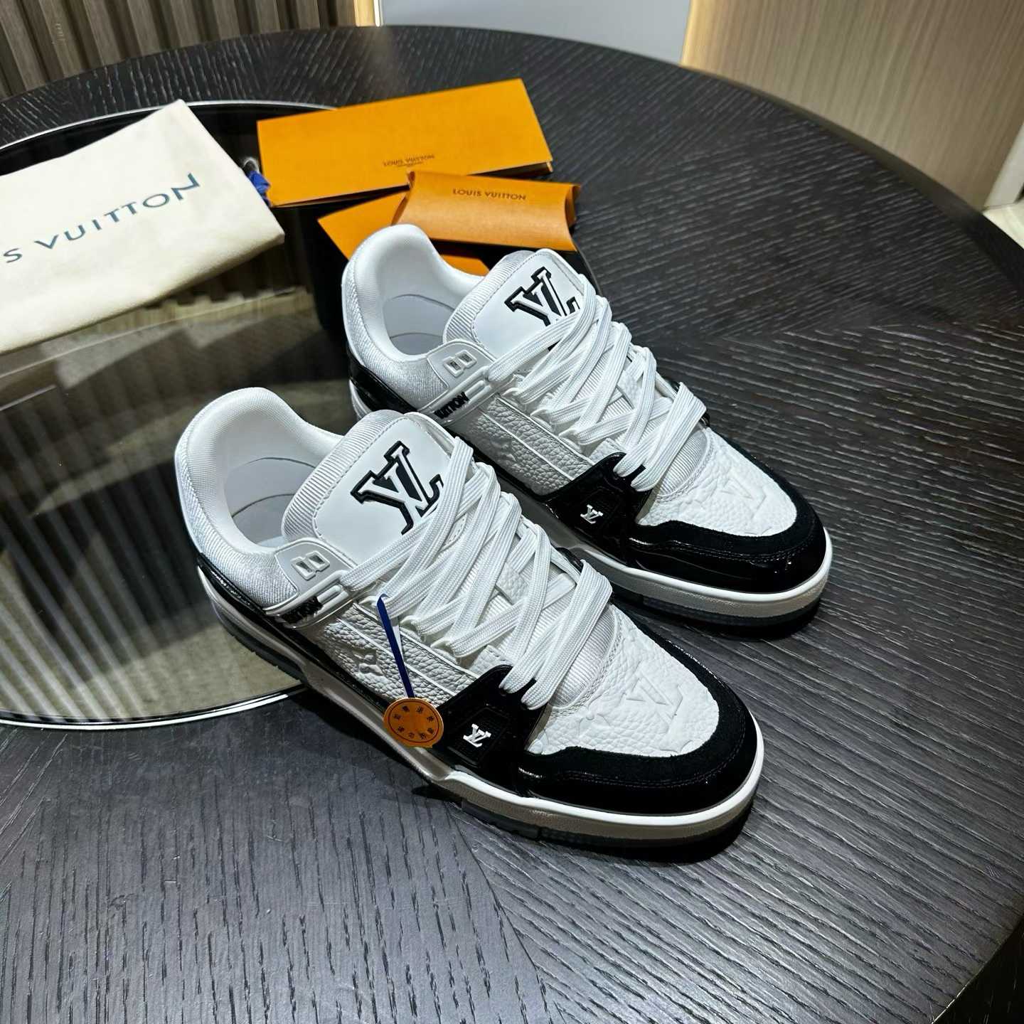LV Trainer sneakers in white and black grained calf leather
