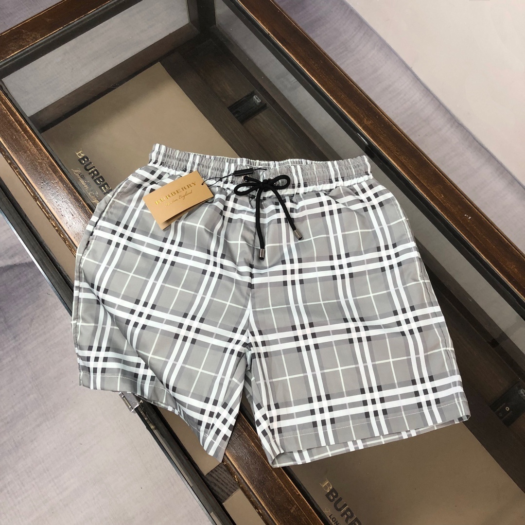 Burberry check swim shorts in grey.