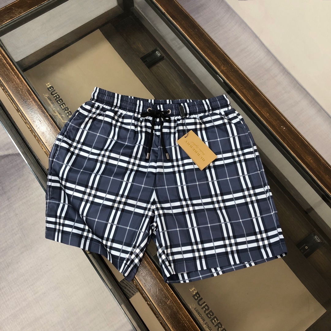 Burberry Check Drawcord Swim Shorts in Carbon Blue nylon.