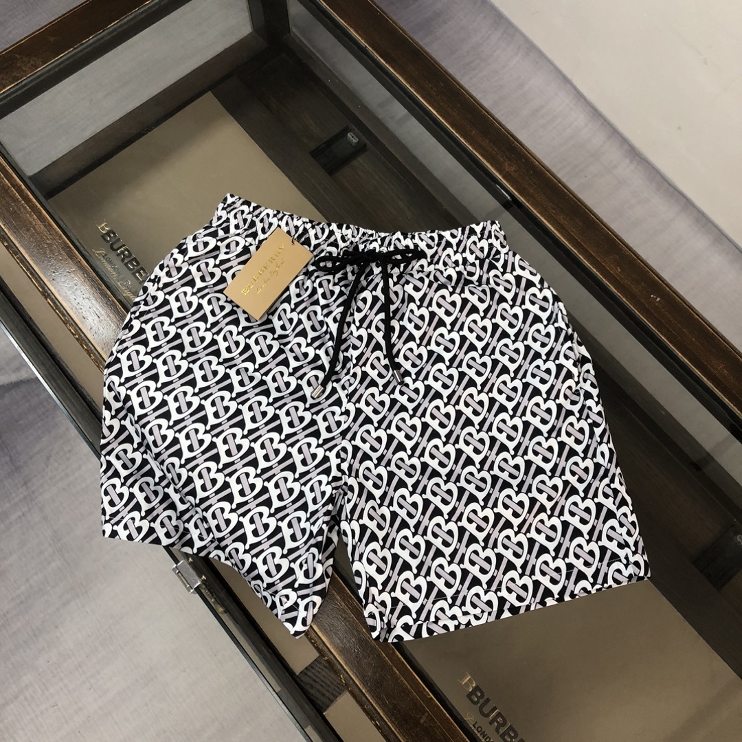 Burberry "B Closure" mulberry silk twill shorts in a black and white