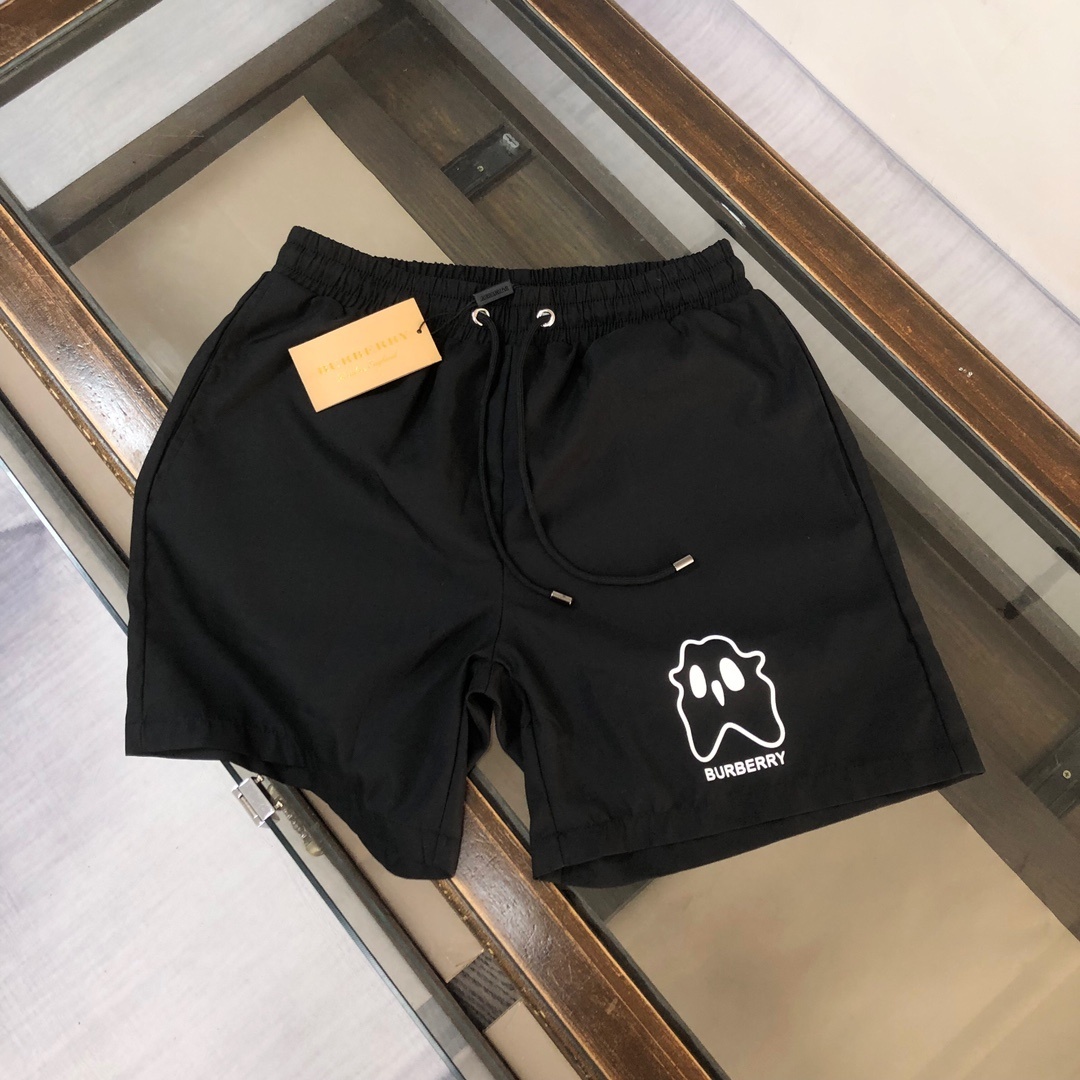Burberry Monster Graphic Drawcord Swim Shorts in black polyester