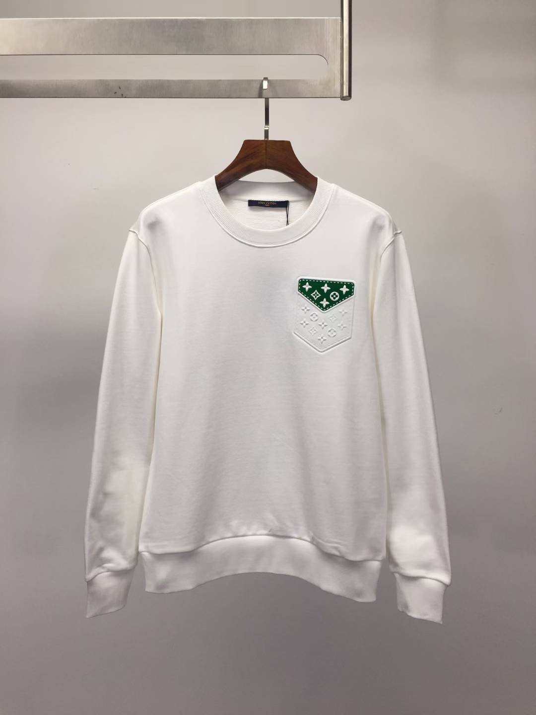 LV men's sweatshirt with a monogram patch on the pocket