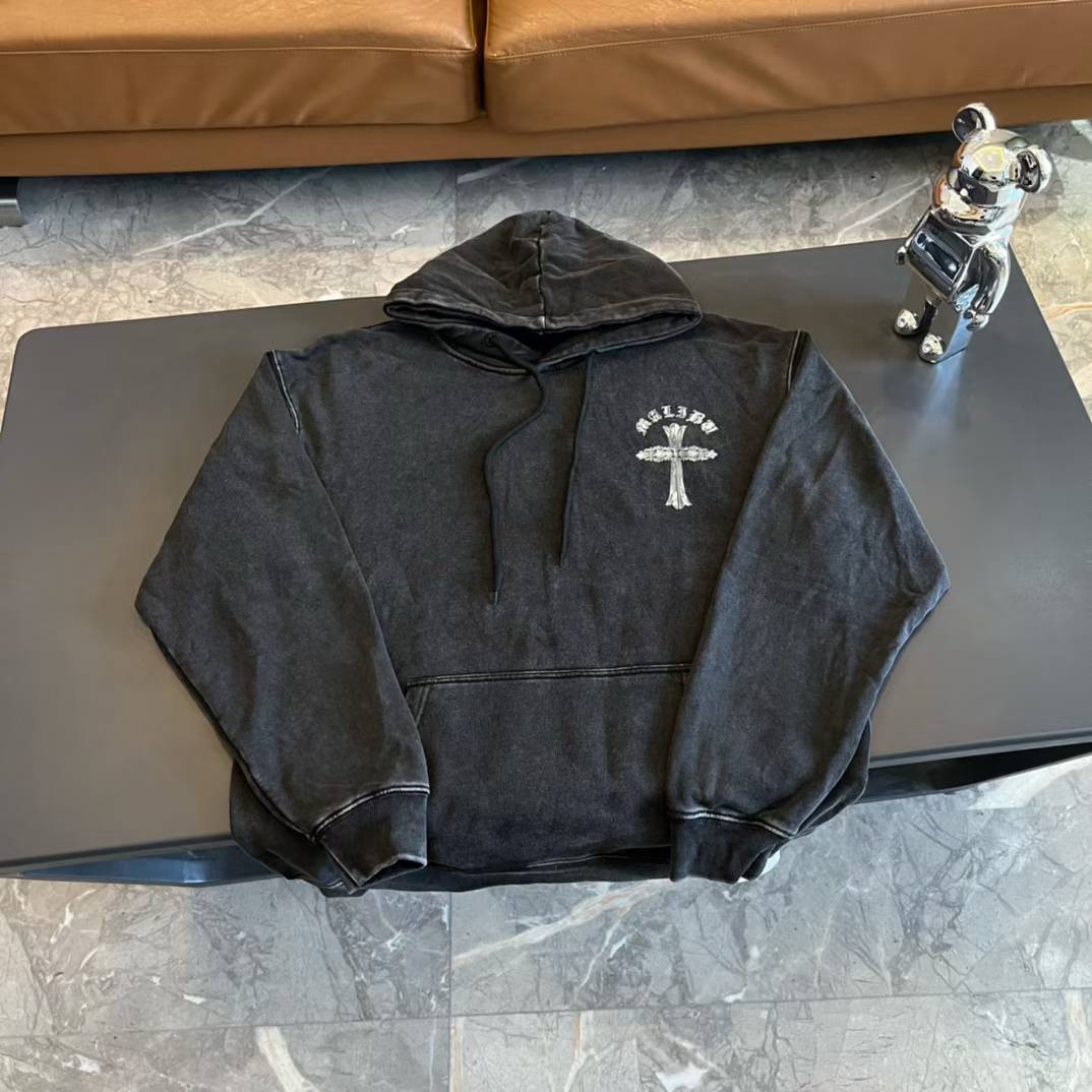 chrome hearts black distressed hoodie with a white cross graphic print on the chest.