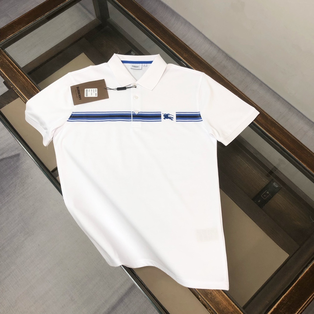 Burberry white short-sleeved polo shirt with a blue striped detail and the brand's Equestrian Knight logo on the chest