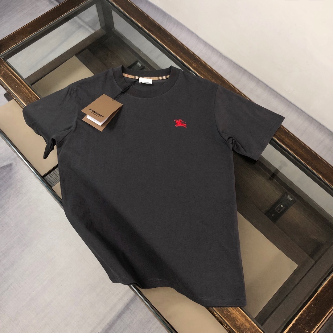 Burberry black cotton t-shirt with a red logo motif.