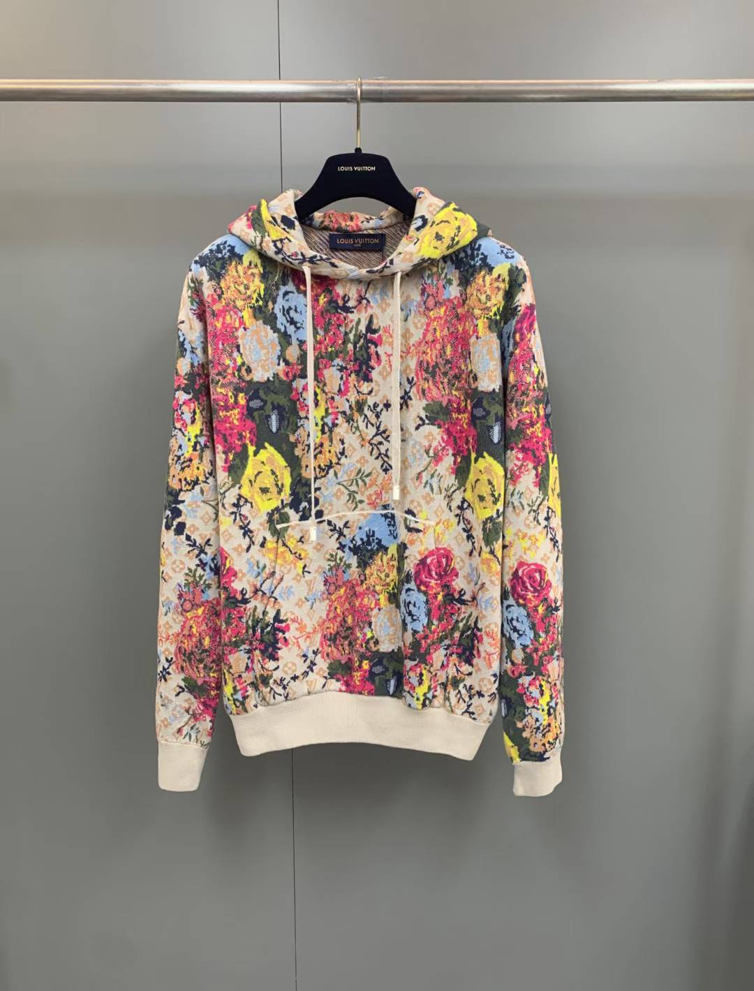 christian dior Flower Graphic Jacquard Hoodie with a beige and multicolored floral pattern.
