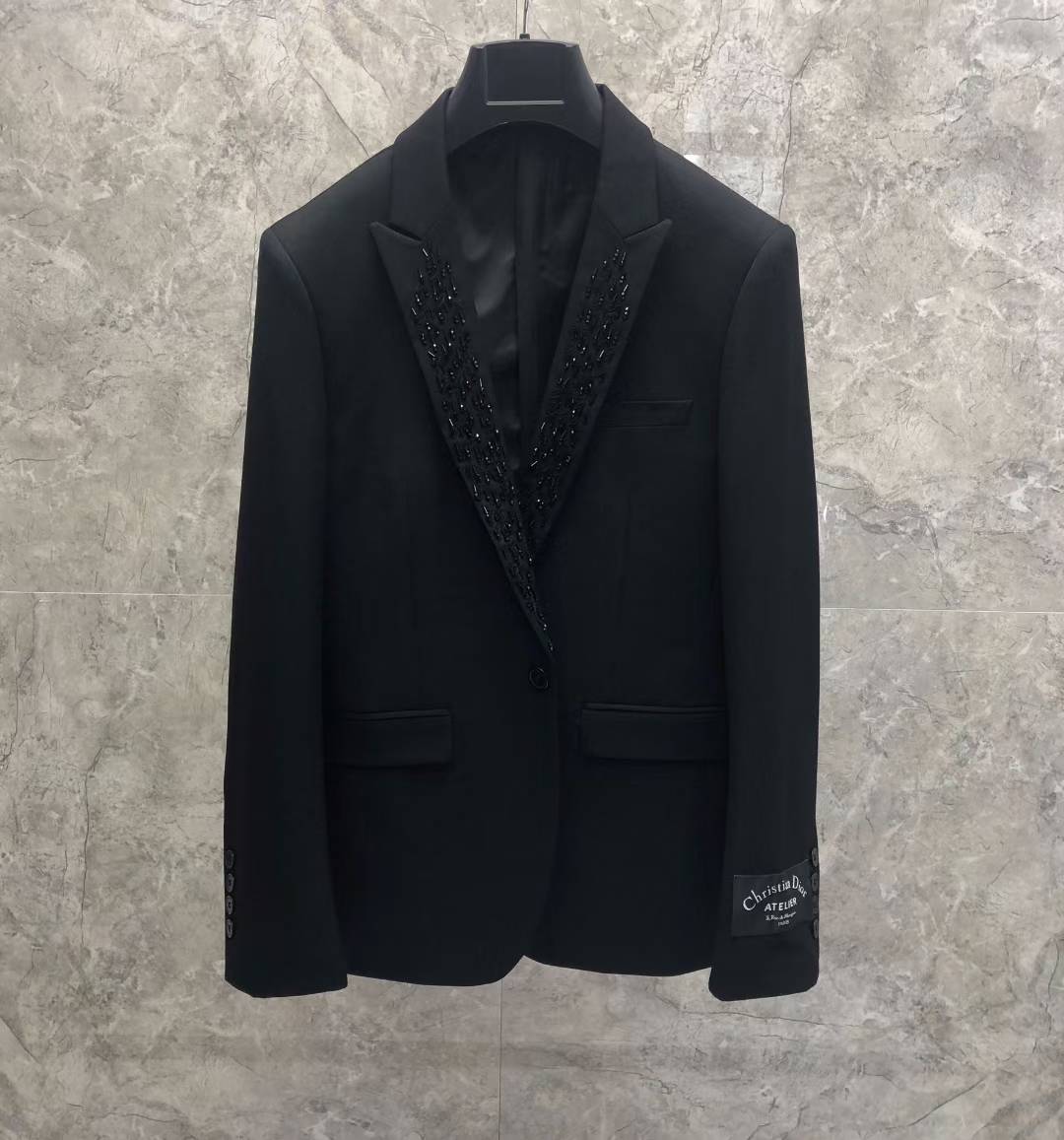 Christian Dior black tuxedo jacket with intricate hand-done bead and crystal embroidery on the lapel.