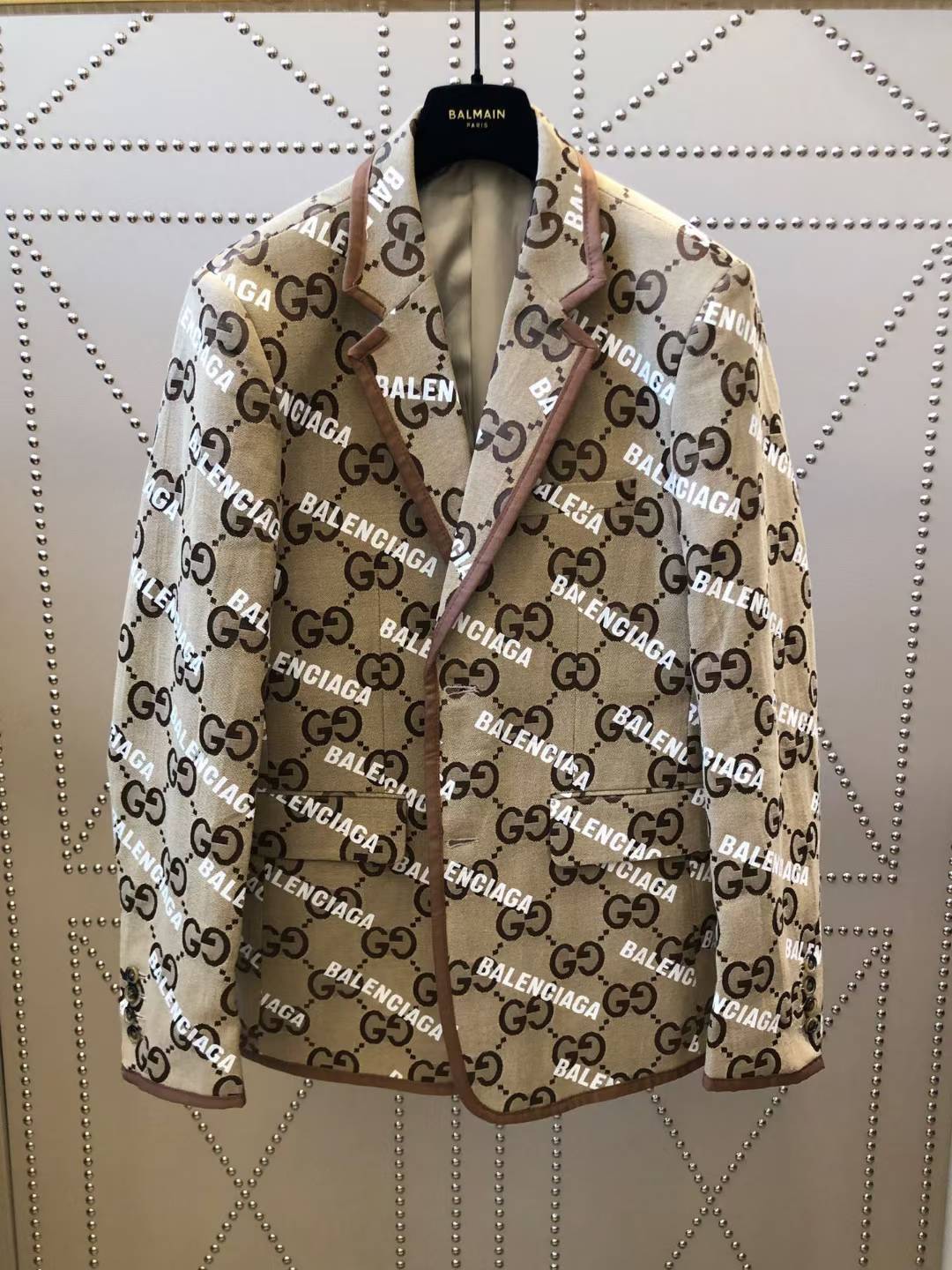 Gucci x Balenciaga The Hacker Project Jumbo GG men's jacket in beige and ebony cotton blend with leather trim.