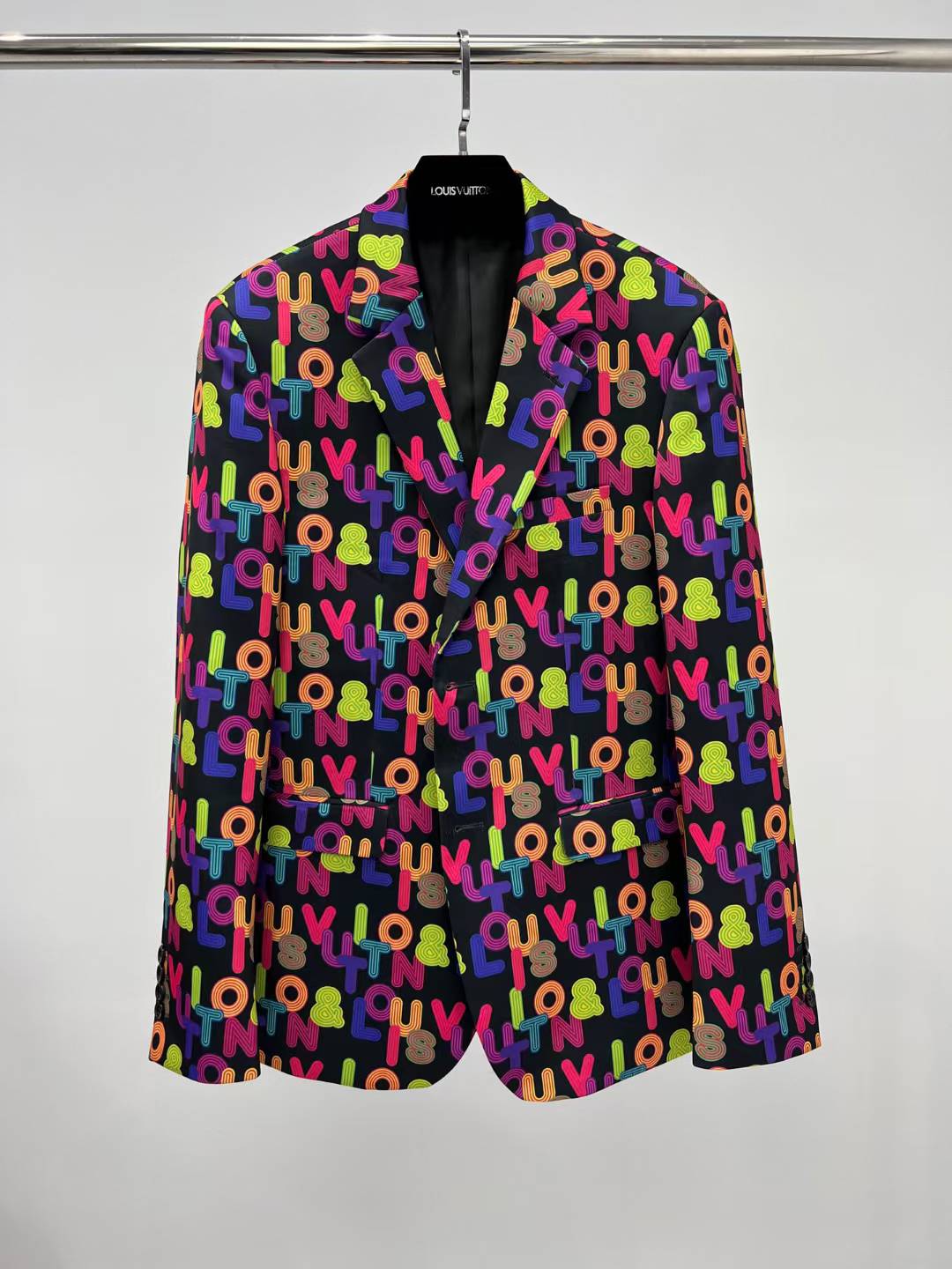 LV black blazer with an allover letter print