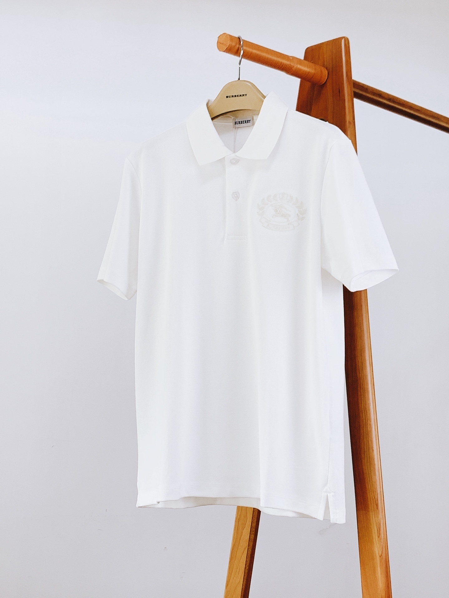 Burberry cotton polo shirt with an embroidered logo.