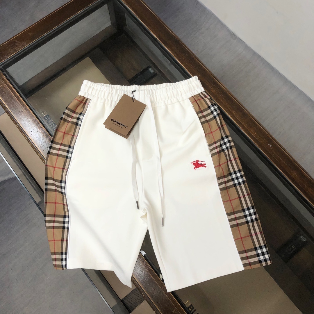Burberry check-trim cotton shorts in white with a red