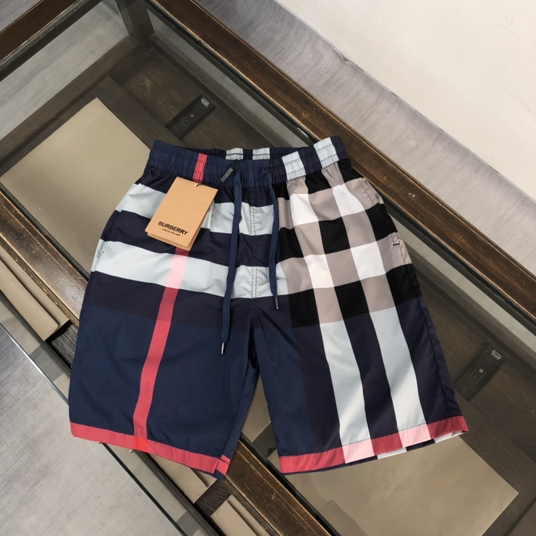 Burberry Check Drawcord Swim Shorts in a carbon blue