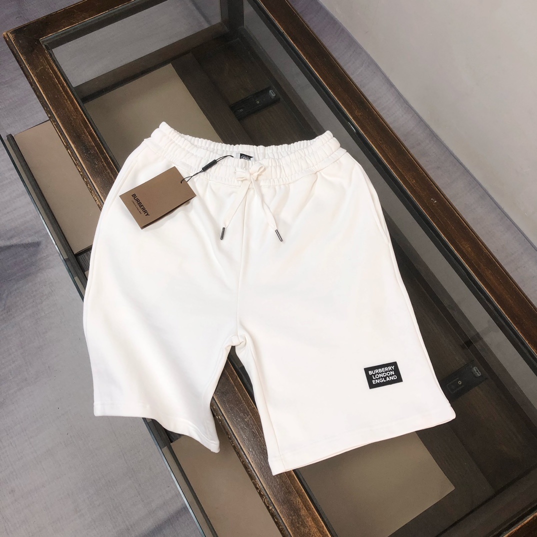 Burberry shorts with a logo patch.