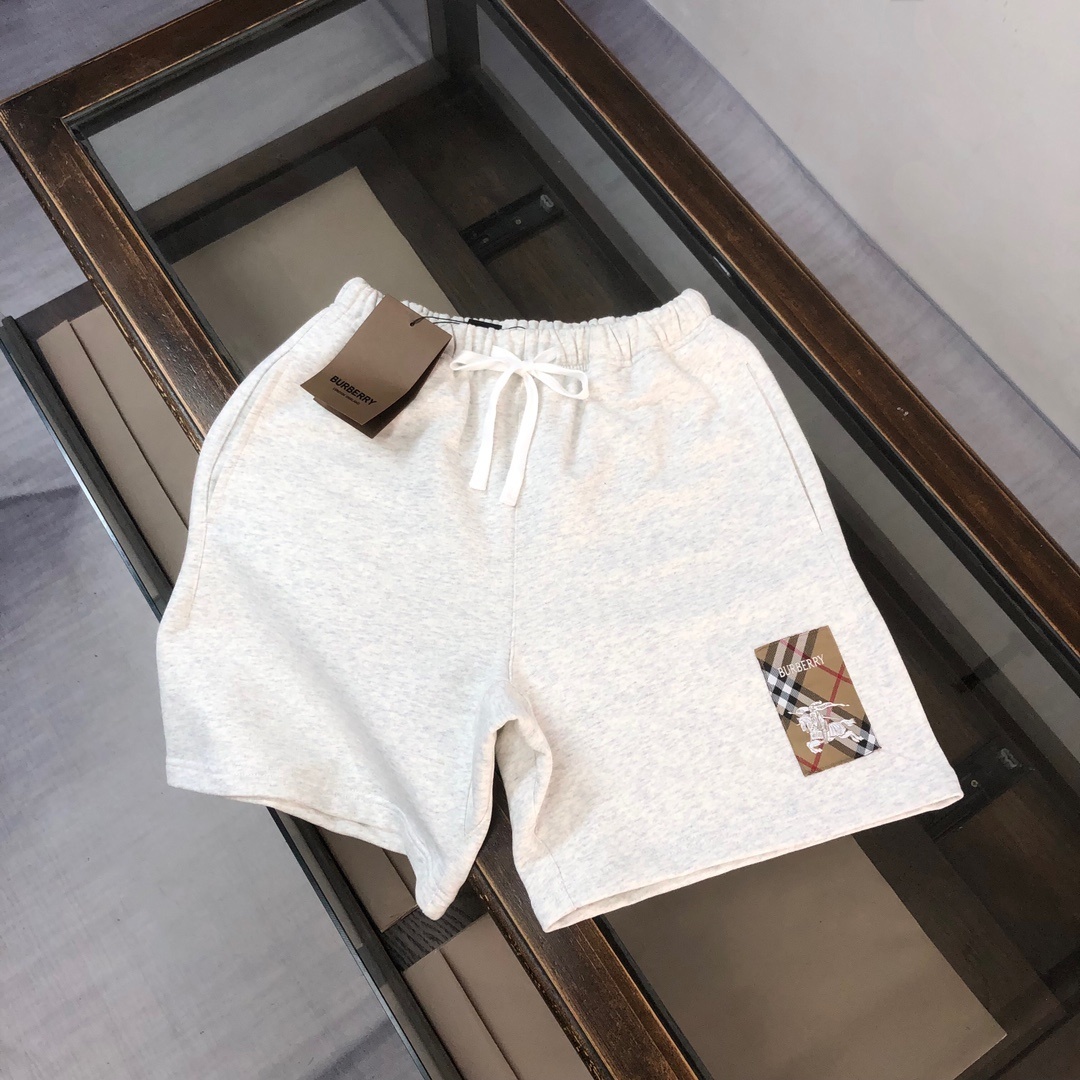 Burberry men's white cotton shorts with check applique