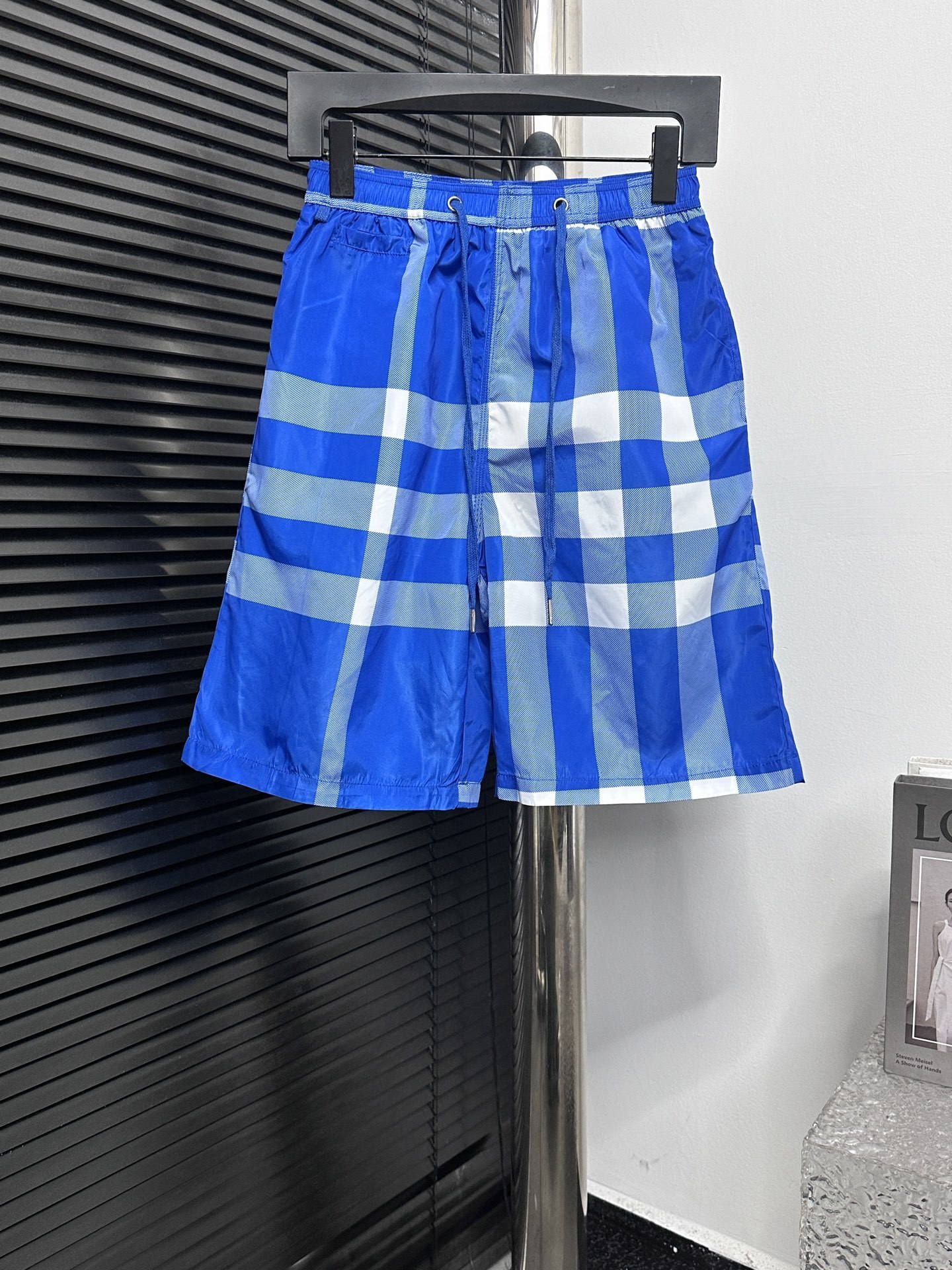 Burberry check-print swim shorts in blue.