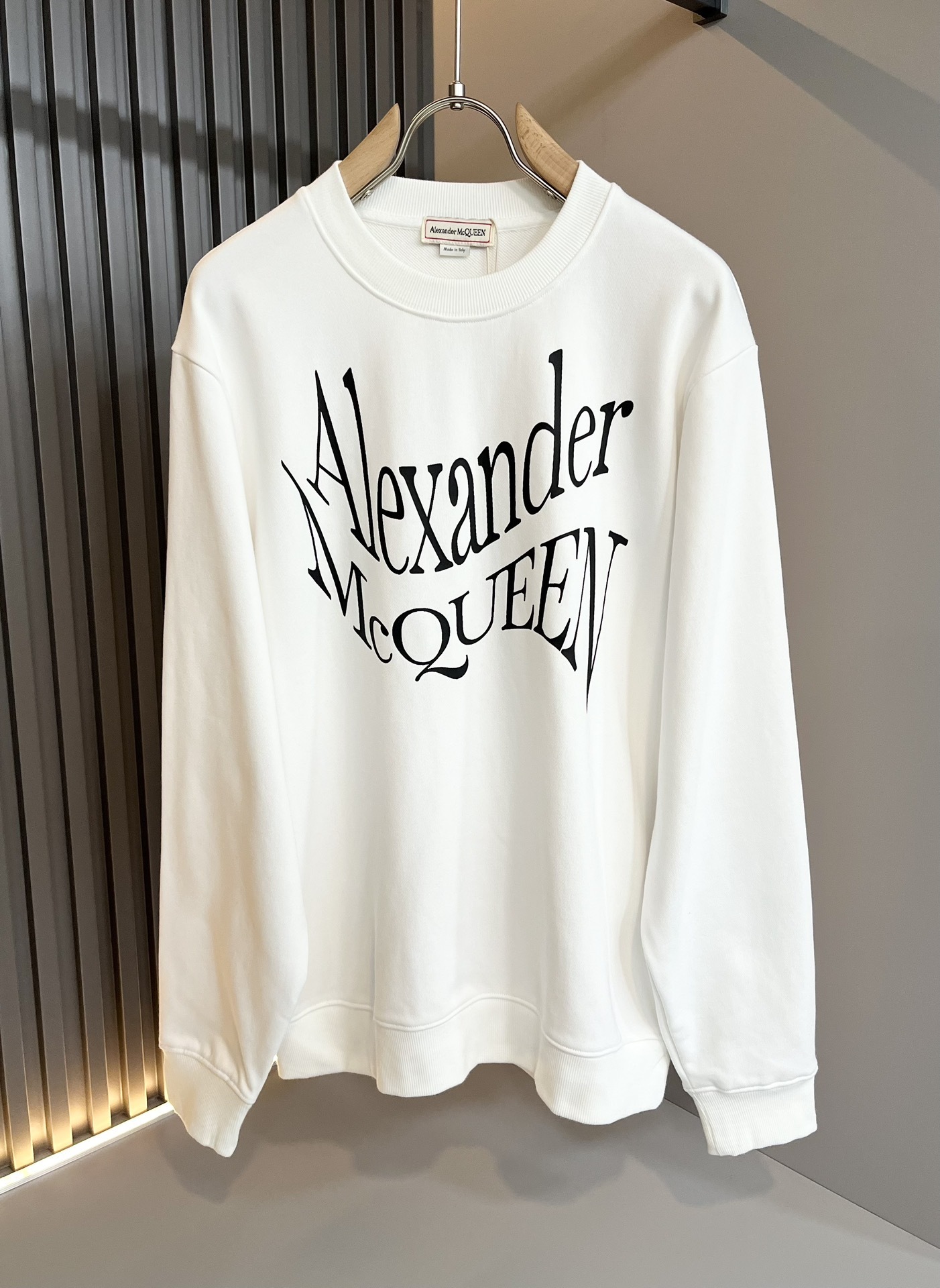 Alexander McQueen logo-print cotton sweatshirt in white.