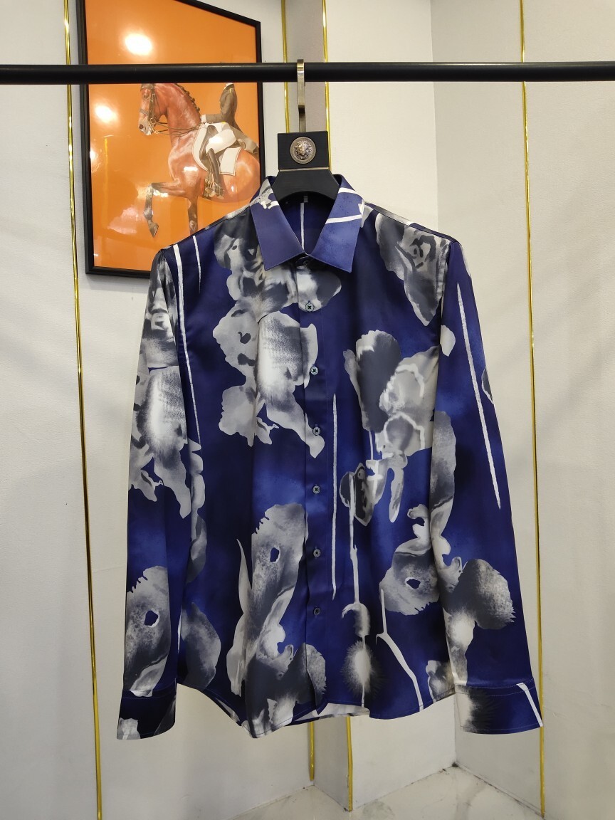 Alexander McQueen men's blue and white floral print long-sleeved shirt.