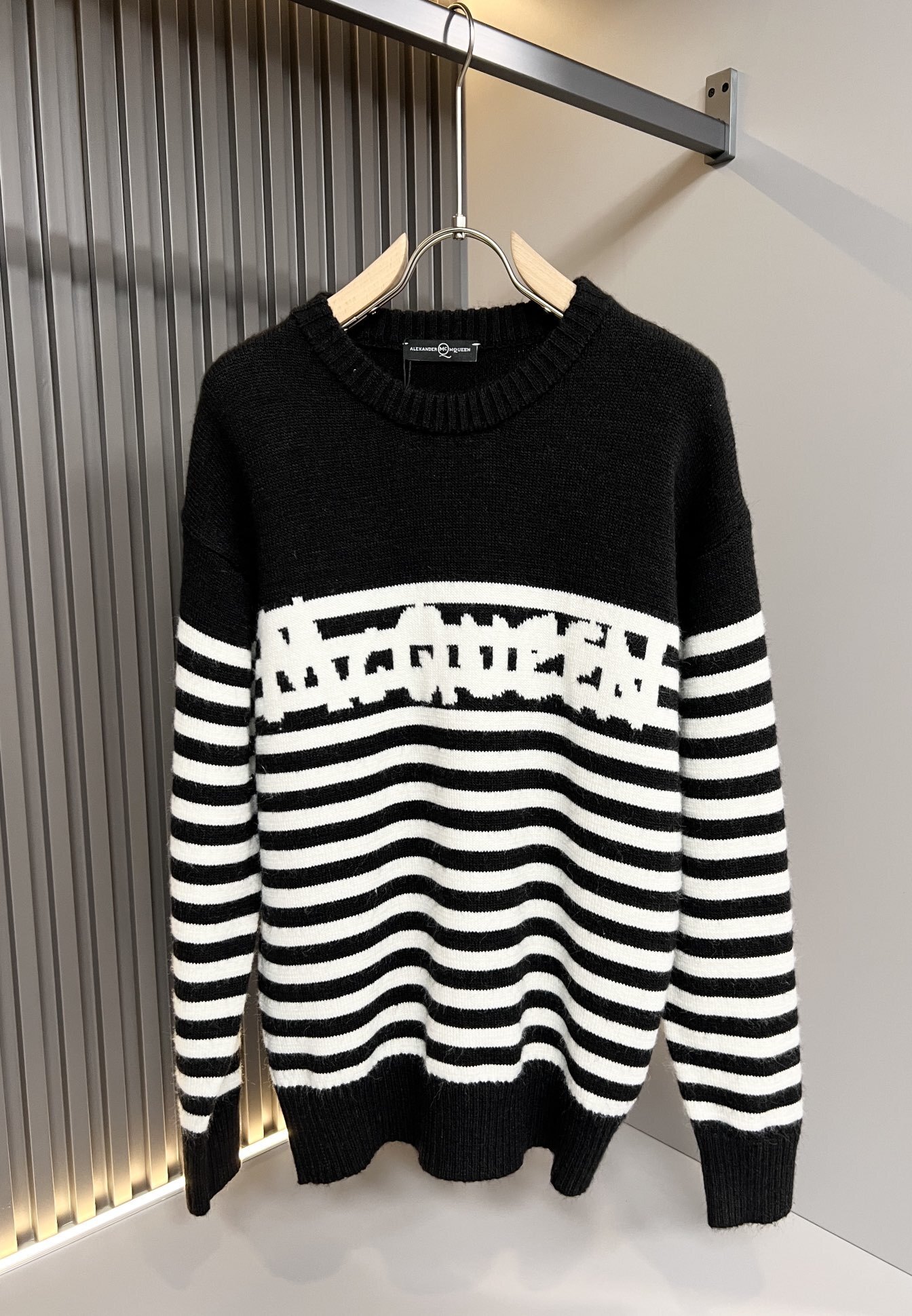 Alexander McQueen logo-intarsia striped cotton sweater.