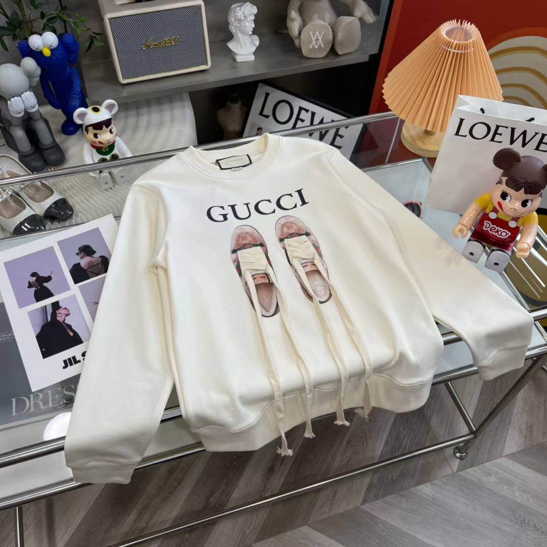 Gucci sweatshirt with a laced shoe graphic print.