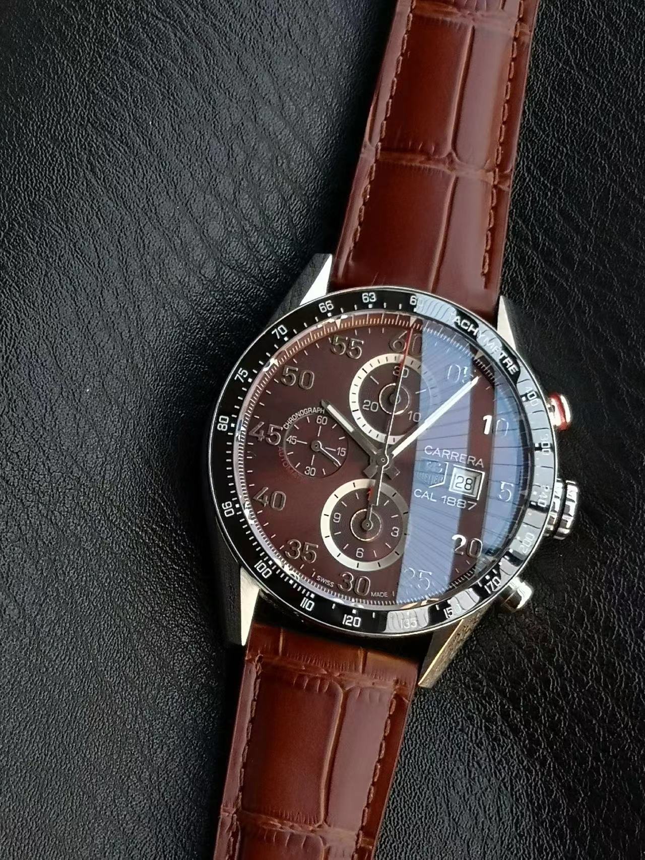 TAG Heuer Carrera Calibre 16 Day-Date automatic chronograph watch with a brown dial and a brown leather strap, reference number CV2A12.FC6236.