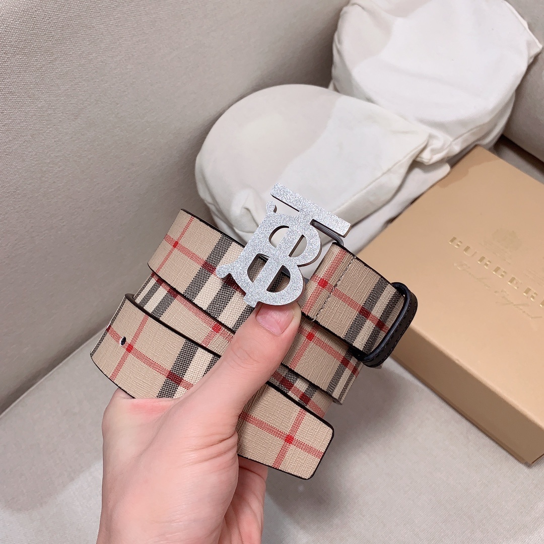 Burberry Reversible Check TB Belt with a glittery silver-tone buckle.