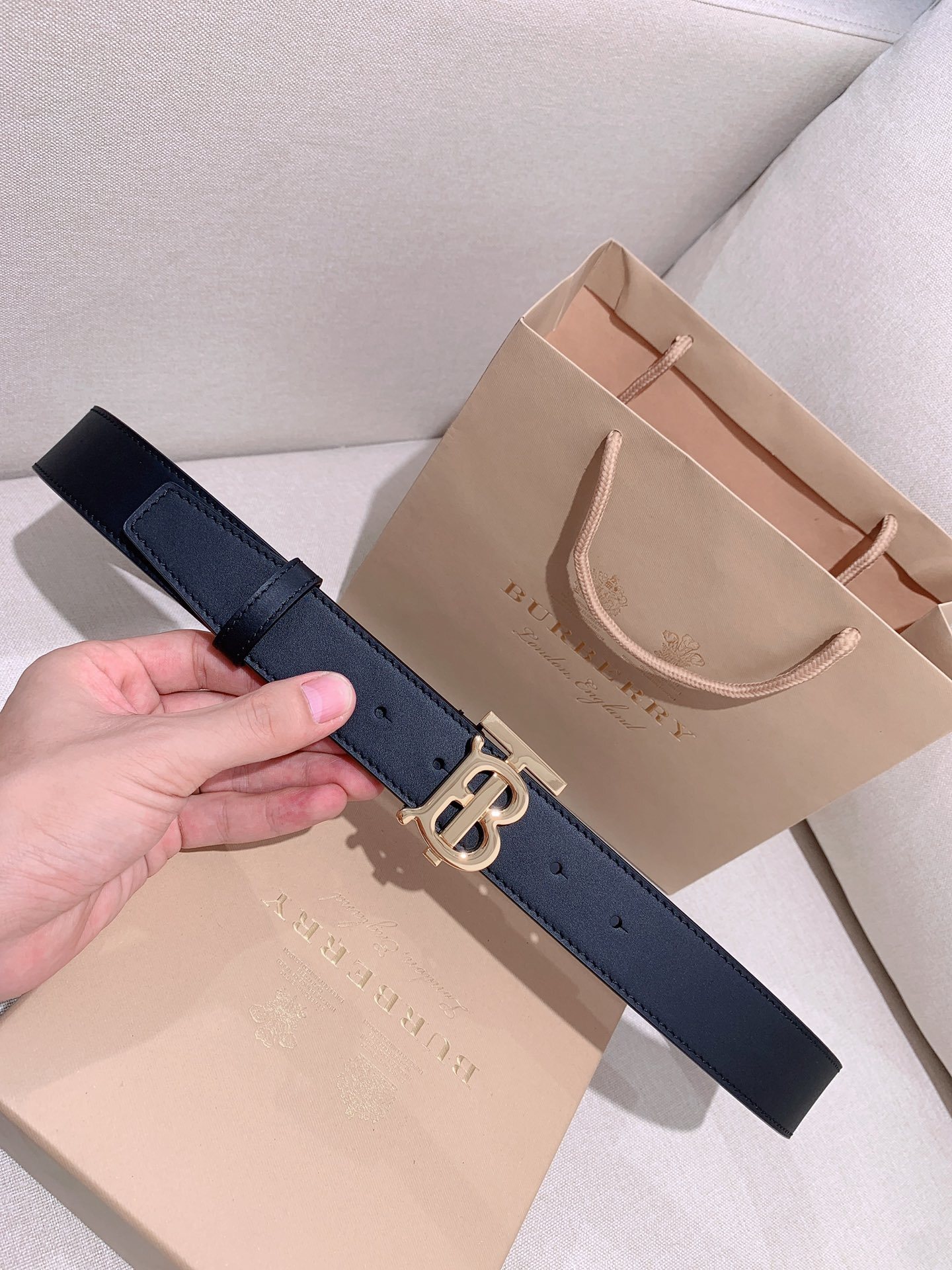 Burberry reversible leather TB belt in black with a gold-plated Thomas Burberry Monogram buckle