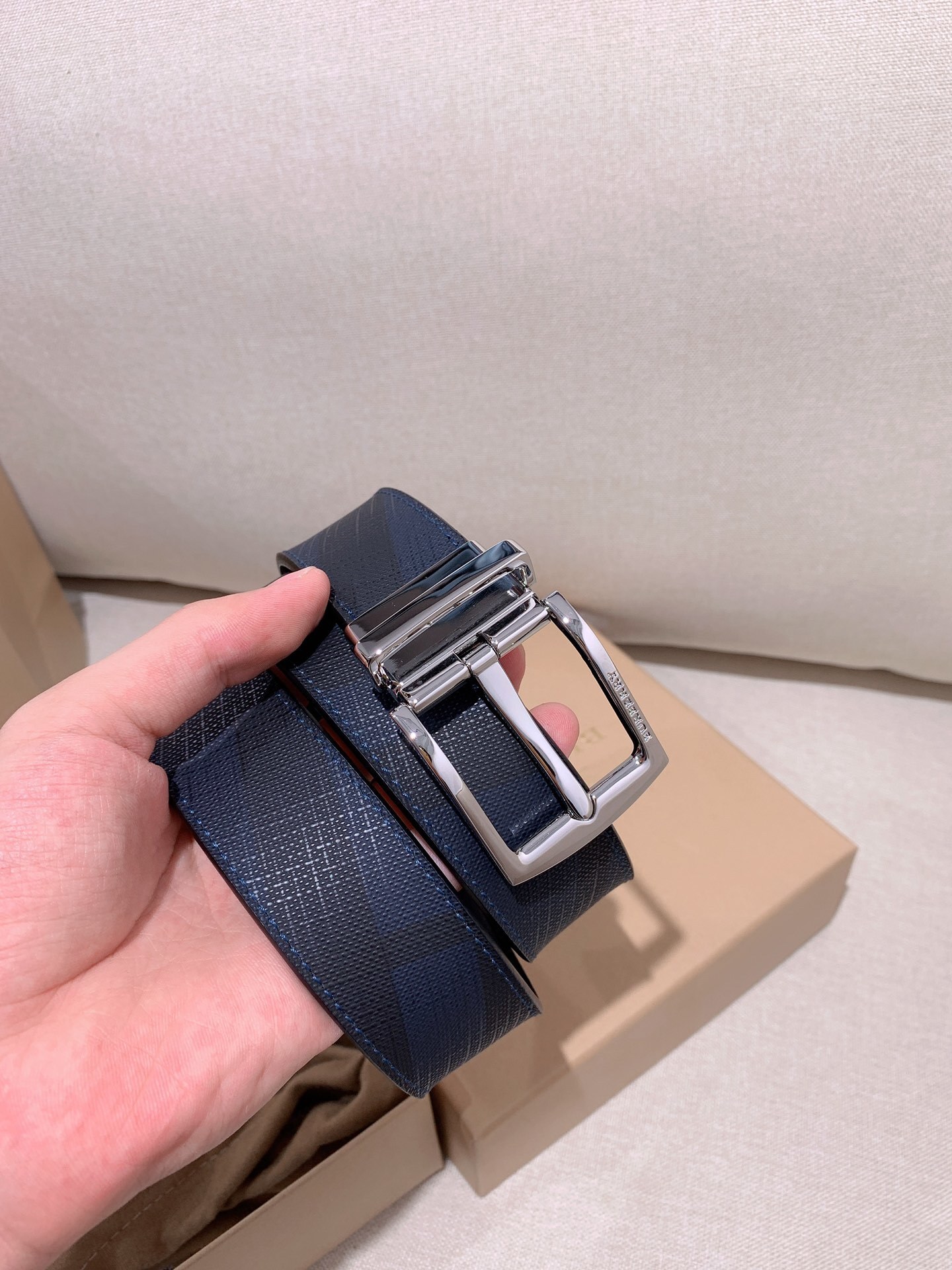 Burberry Reversible Check Belt in charcoal grey leather with a silver-tone buckle.