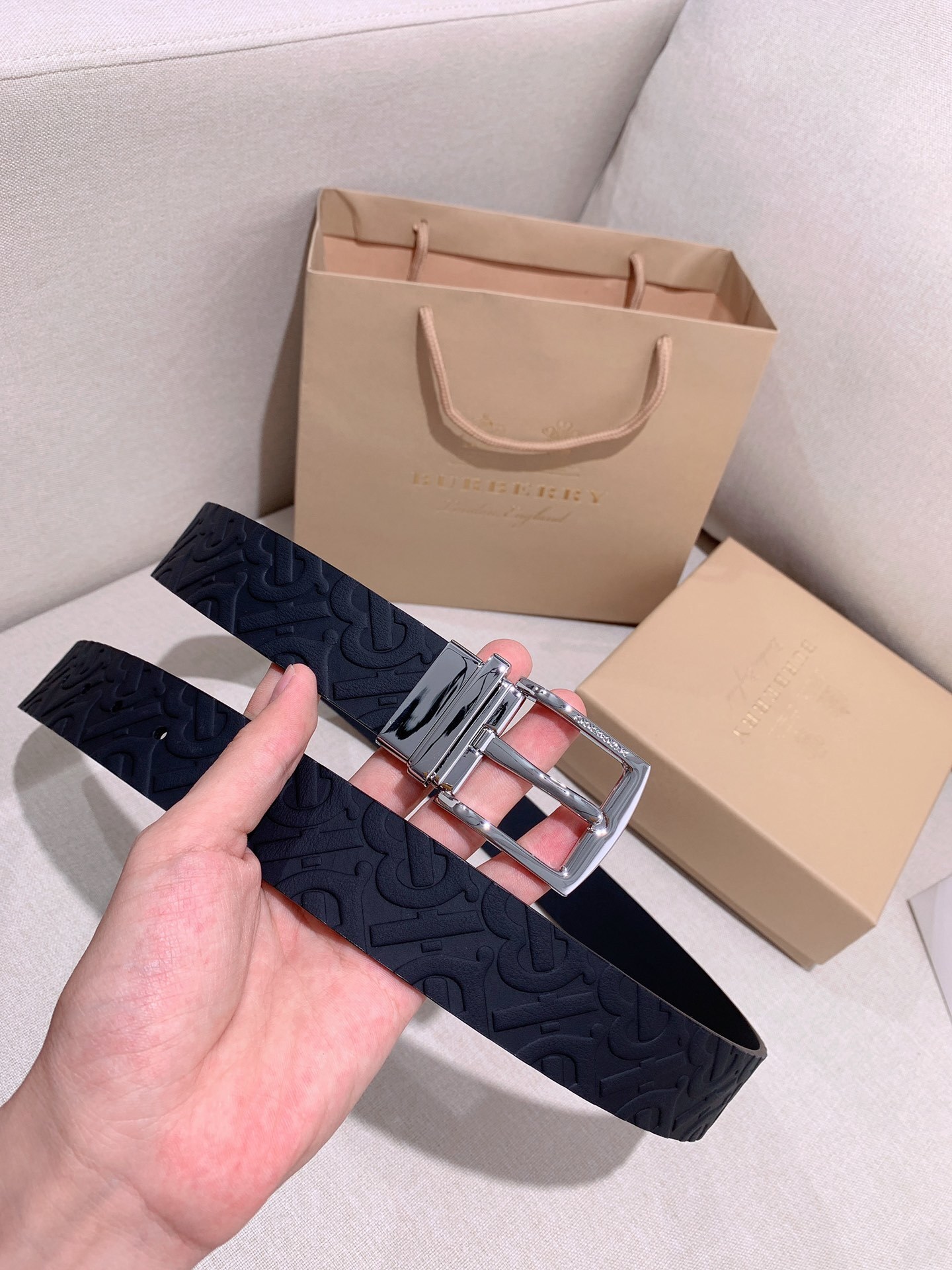 Burberry Reversible Leather TB Belt with a palladium-plated Thomas Burberry Monogram plaque buckle.