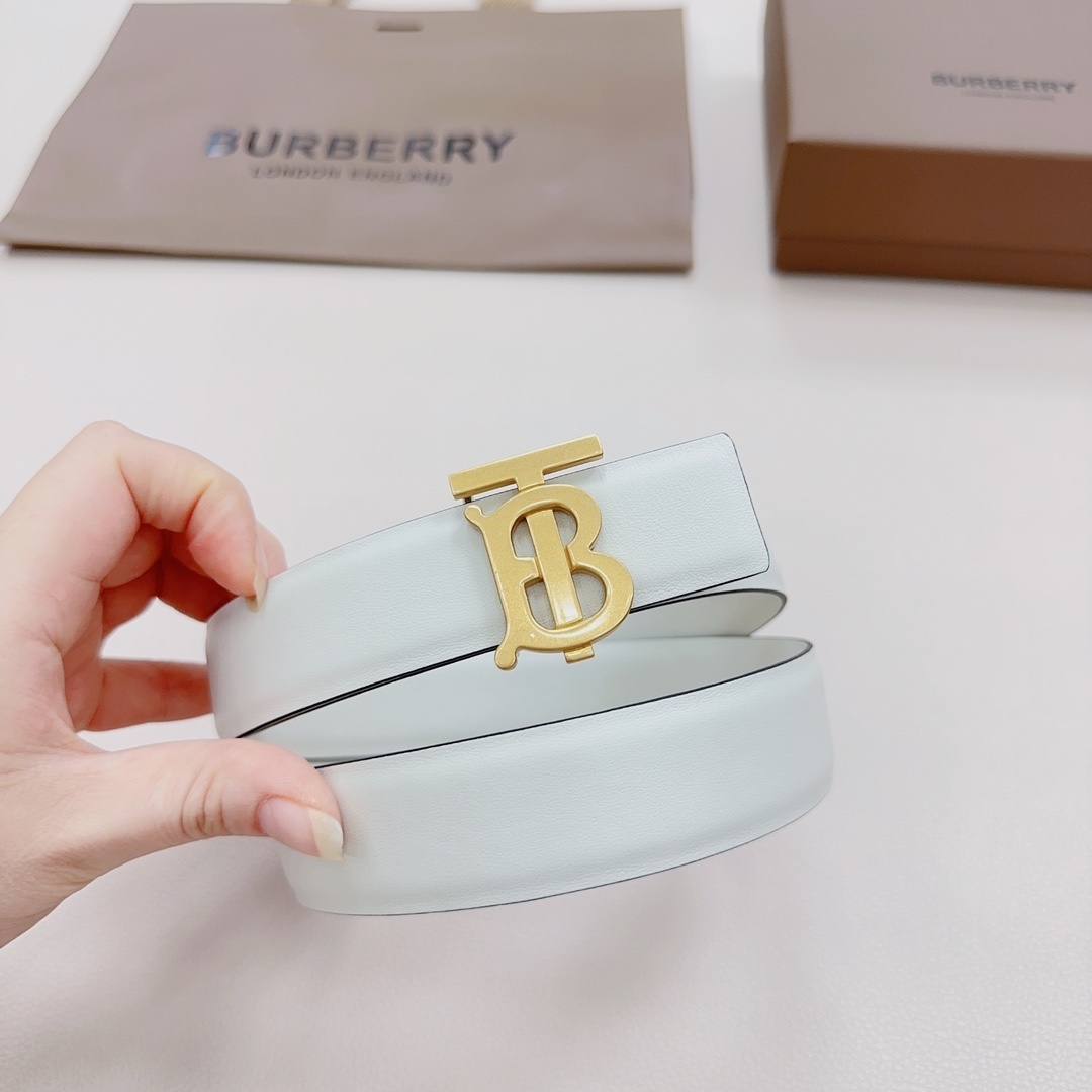 Burberry TB reversible leather belt in white leather with a gold-tone monogram buckle.