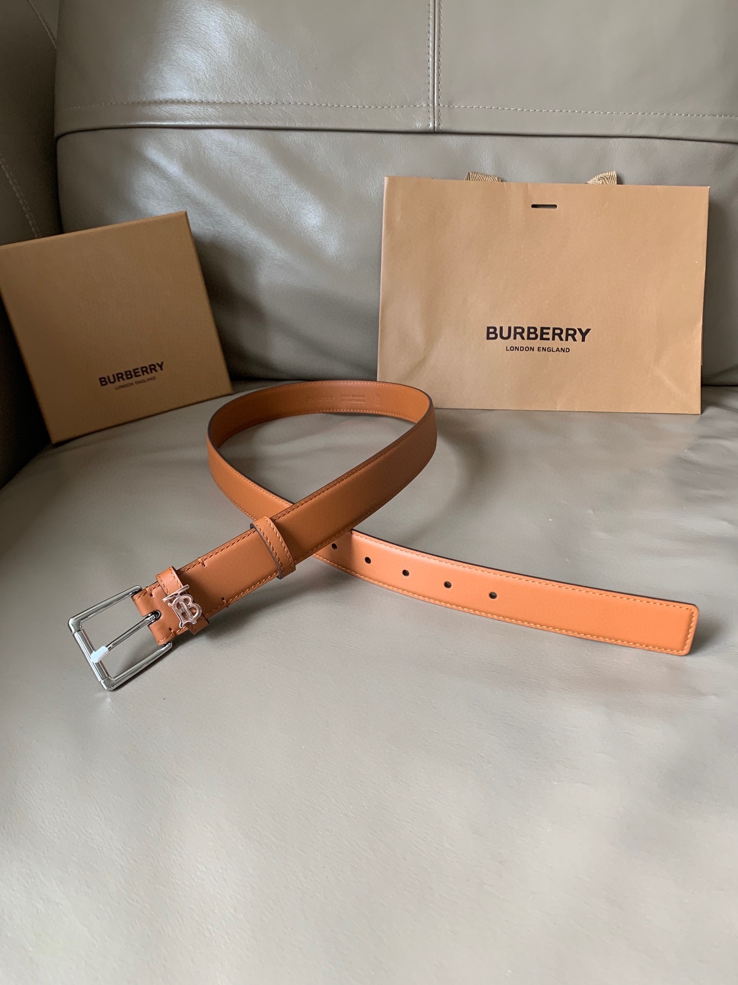 Burberry tan leather belt with a silver-toned buckle