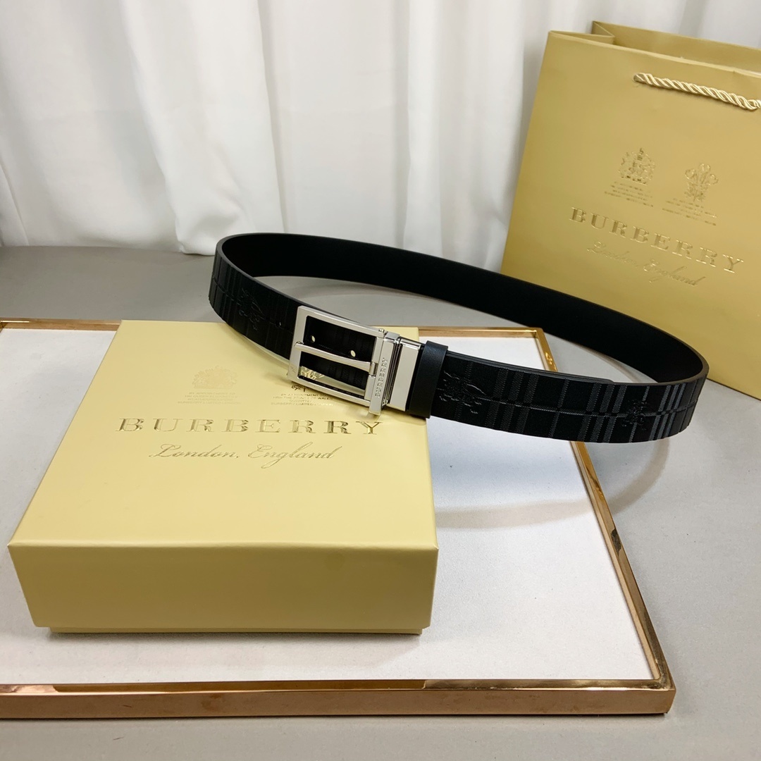 Burberry Check Leather Belt made of calf leather with a silver-tone buckle.