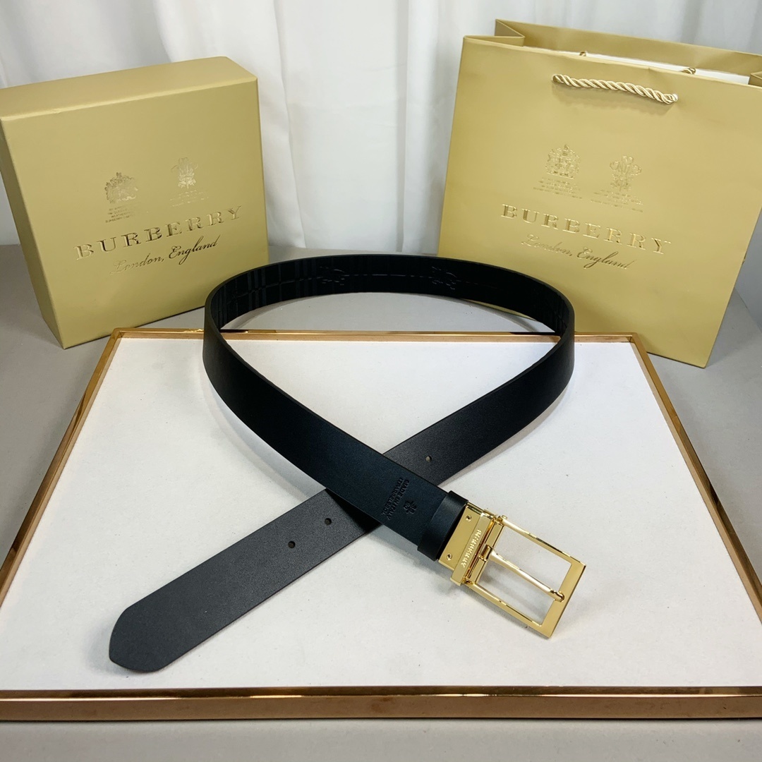 Burberry black leather belt with a gold-tone buckle.